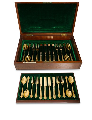 Lot 423 - A 35-piece set of Victorian silver gilt dessert cutlery and flatware with one addition