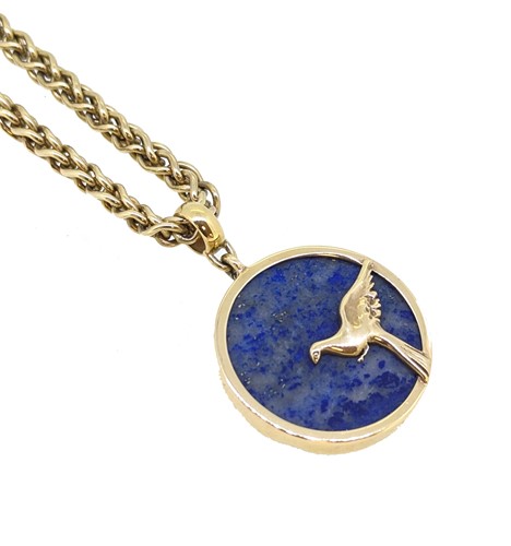 Lot 124 - A 9ct gold Lapis Lazuli pendant and chain
