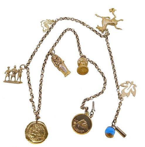Lot 138 - A chain with charms