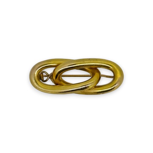 Lot 83 - A figure of eight style brooch