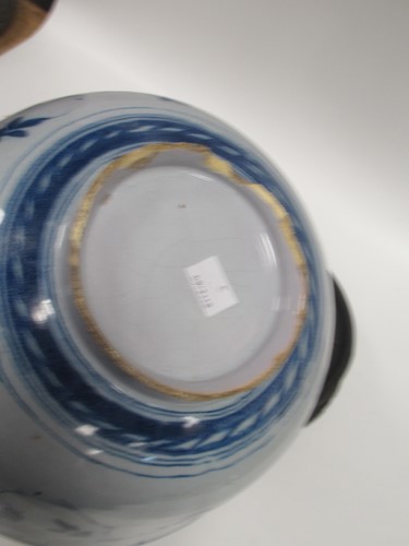 Lot 20 - An 18th century Delft blue and white bowl, on...