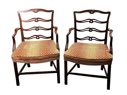 Lot 659 - A pair of 18th century mahogany ladder back...