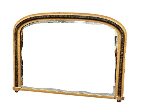 Lot 671 - A Victorian overmantel mirror, of rounded...