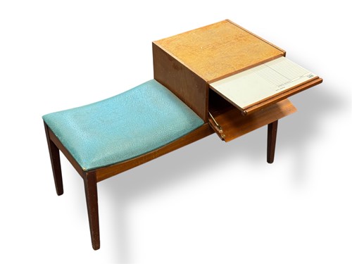 Lot 463 - A late 20th century teak telephone table,...