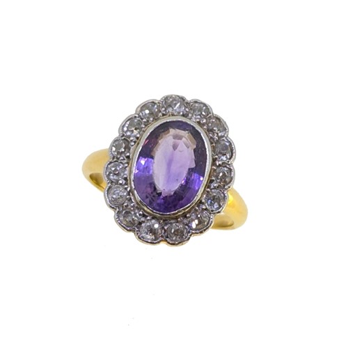 Lot 80 - An amethyst and diamond cluster ring