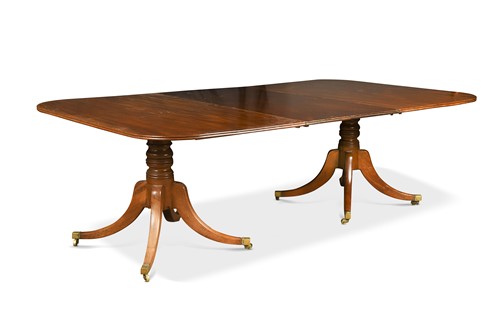 Lot 423 - A mahogany twin pedestal dining table, 19th century