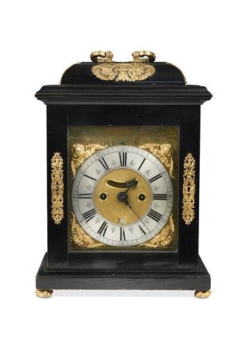 Lot An ebonised table clock signed William Tomlinson, London, circa 1700