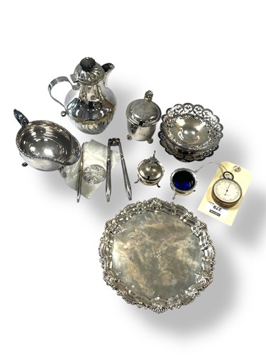 Lot 279 - A silver waiter and two silver cruets, 255g...