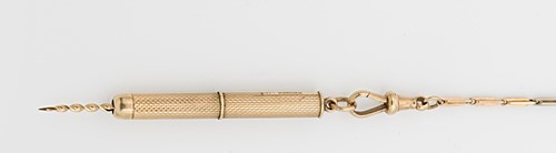 Lot 335 - A 20th century 9ct gold cigar piercer with accompanying chain