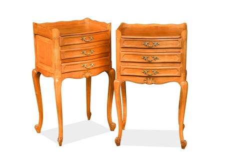 Lot 487 - A pair of vintage French provincial pale cherrywood bedside tables