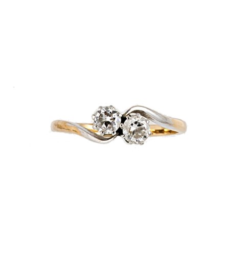 Lot 117 - A two stone diamond crossover style ring