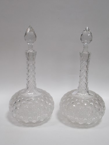 Lot 26 - A pair of cut glass decanters of sphere and...