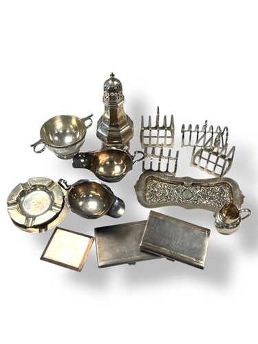 Lot 292 - A collection of silverware including ashtrays,...