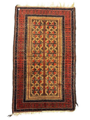 Lot 712 - A Beluchi rug circa 1930, in ecru, rust black...