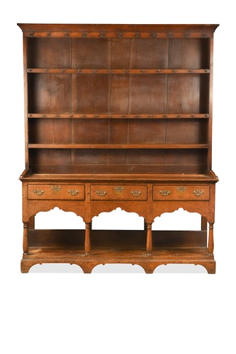 Lot 278 - A George III oak kitchen dresser