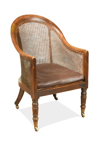 Lot 382 - A Regency simulated rosewood bergere armchair