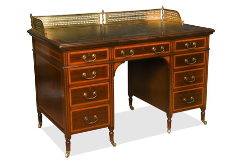 Lot 566 - A late Victorian mahogany and satinwood desk