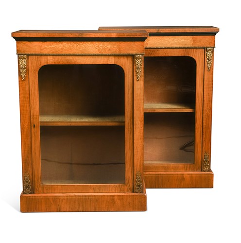 Lot 511 - A pair of Victorian walnut pier cabinets