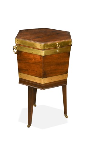 Lot 421 - A George III hexagonal mahogany and brass bound wine cooler