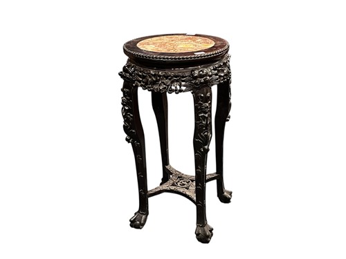 Lot 672 - An Oriental carved and pierced hardwood stand...