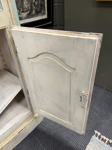 Lot 469 - A French provincial style painted breakfront bookcase