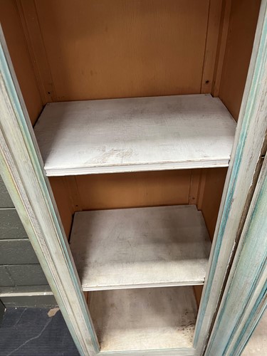 Lot 469 - A French provincial style painted breakfront bookcase