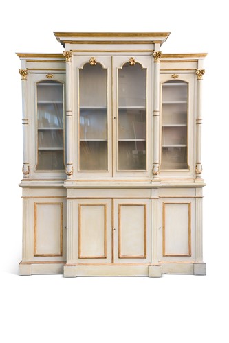Lot A Neoclassical style grey painted parcel gilt breakfront bookcase, 20th century