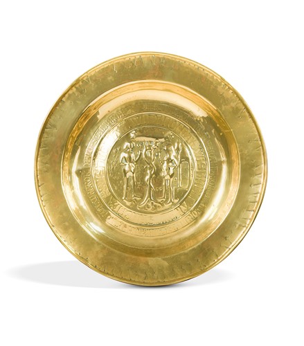 Lot 254 - A Nuremburg brass alms dish, 16th century