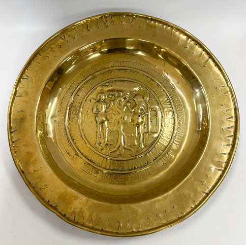 Lot 254 - A Nuremburg brass alms dish, 16th century