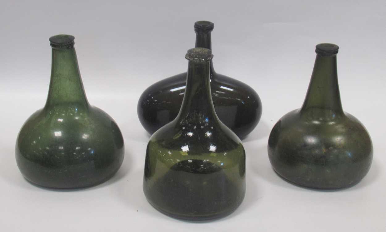 Lot 9 - A group of 18th century bottles, onion shaped...