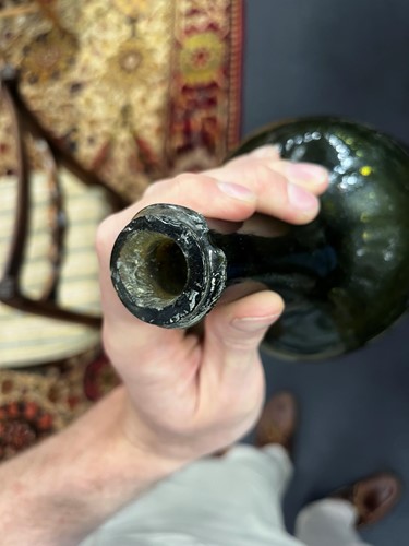 Lot 9 - A group of 18th century bottles, onion shaped...