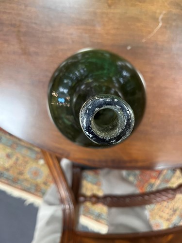 Lot 9 - A group of 18th century bottles, onion shaped...
