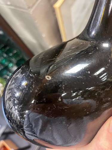 Lot 9 - A group of 18th century bottles, onion shaped...
