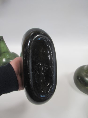 Lot 9 - A group of 18th century bottles, onion shaped...
