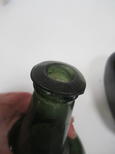 Lot 9 - A group of 18th century bottles, onion shaped...