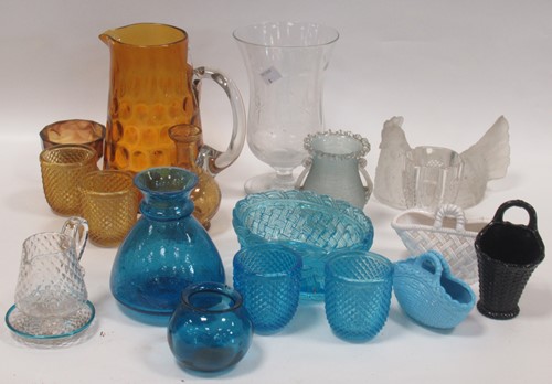 Lot 105 - A dimpled Victorian hand blown jug; turquoise...