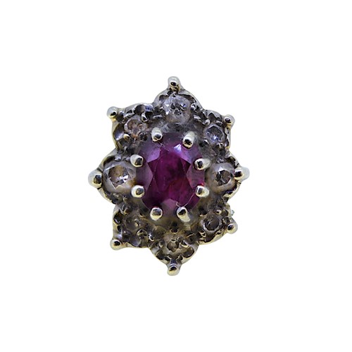 Lot 86 - A ruby and diamond cluster ring