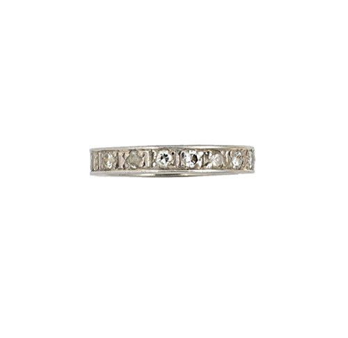Lot 63 - A diamond set full eternity ring