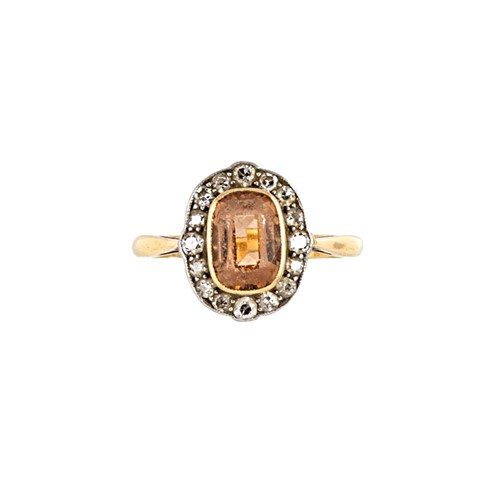 Lot 181 - A topaz and diamond cluster ring