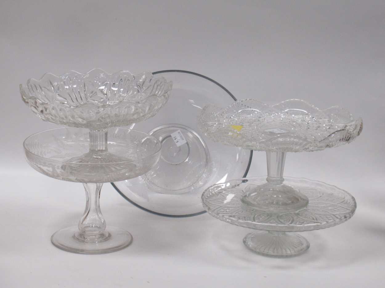 Lot 21 - An engraved cake stand or tazza with all over...