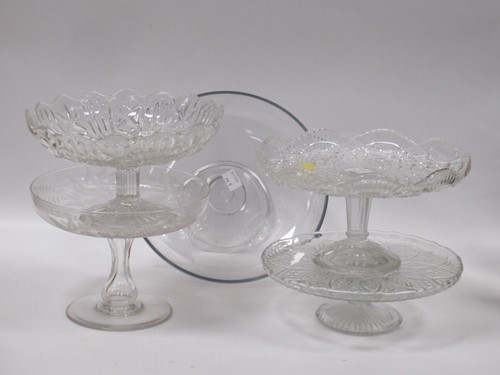 Lot 21 - An engraved cake stand or tazza with all over...