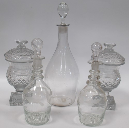 Lot 100 - Mid size cut glass decanters, to include a...