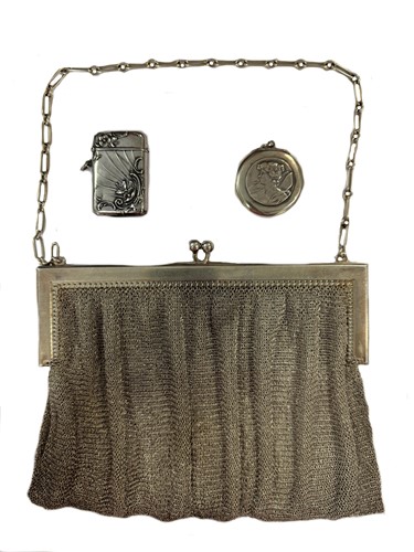 Lot 325 - A continental metalwares silver mesh evening purse, vesta case and miniature compact
