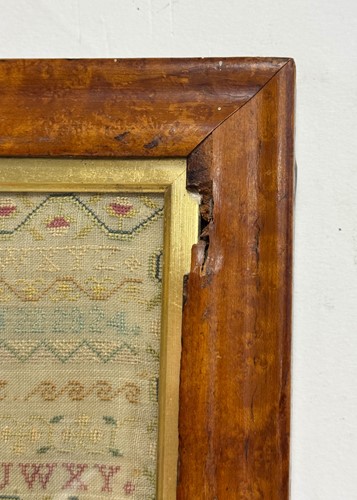 Lot 306 - A George IV needlework sampler, dated 1827