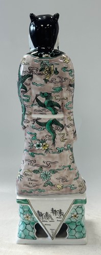 Lot 56 - A set of eight Chinese famille verte style Daoist Immortals