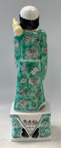 Lot 56 - A set of eight Chinese famille verte style Daoist Immortals