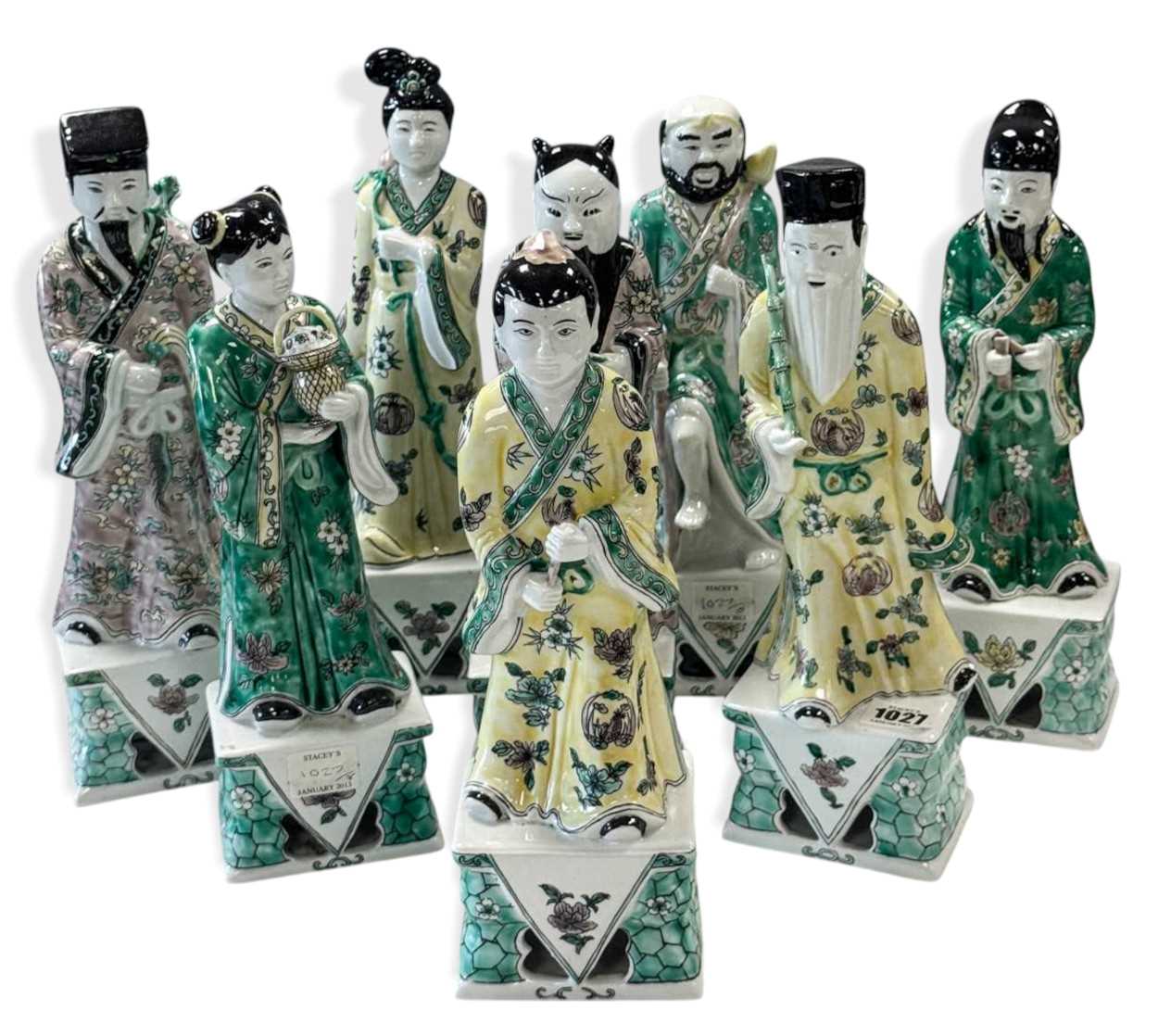 Lot 56 - A set of eight Chinese famille verte style Daoist Immortals