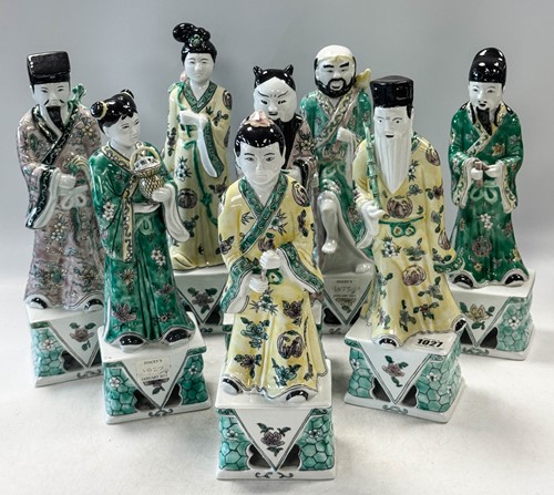 Lot 56 - A set of eight Chinese famille verte style Daoist Immortals