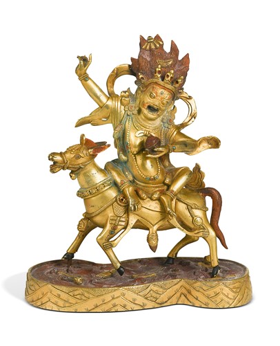 Lot 87 - A Tibetan style gilt-bronze figure of Palden Lhamo on a mule
