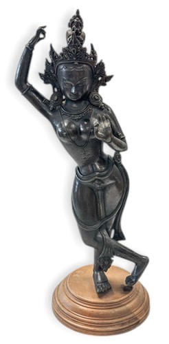 Lot 92 - An Indo-Nepalese bronze large dancing figure of a Tara, Bodhisattva of Compassion